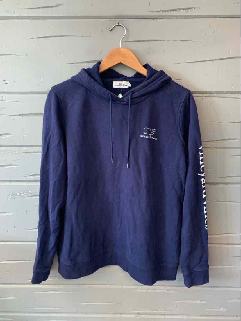 Navy blue hoodie with front pocket, white Vineyard Vines logo on chest, and white text down left sleeve.