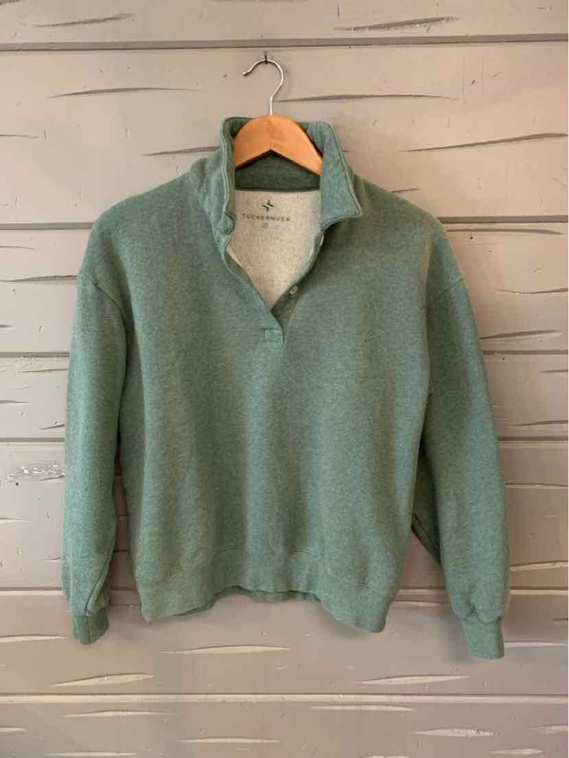 Green quarter-zip pullover sweater with a soft, textured fabric and ribbed cuffs and hem.