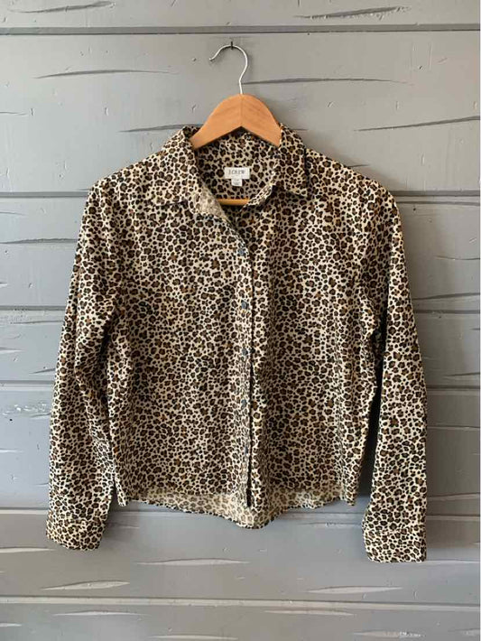 Leopard print button-up shirt with long sleeves and collar in women's size XS.