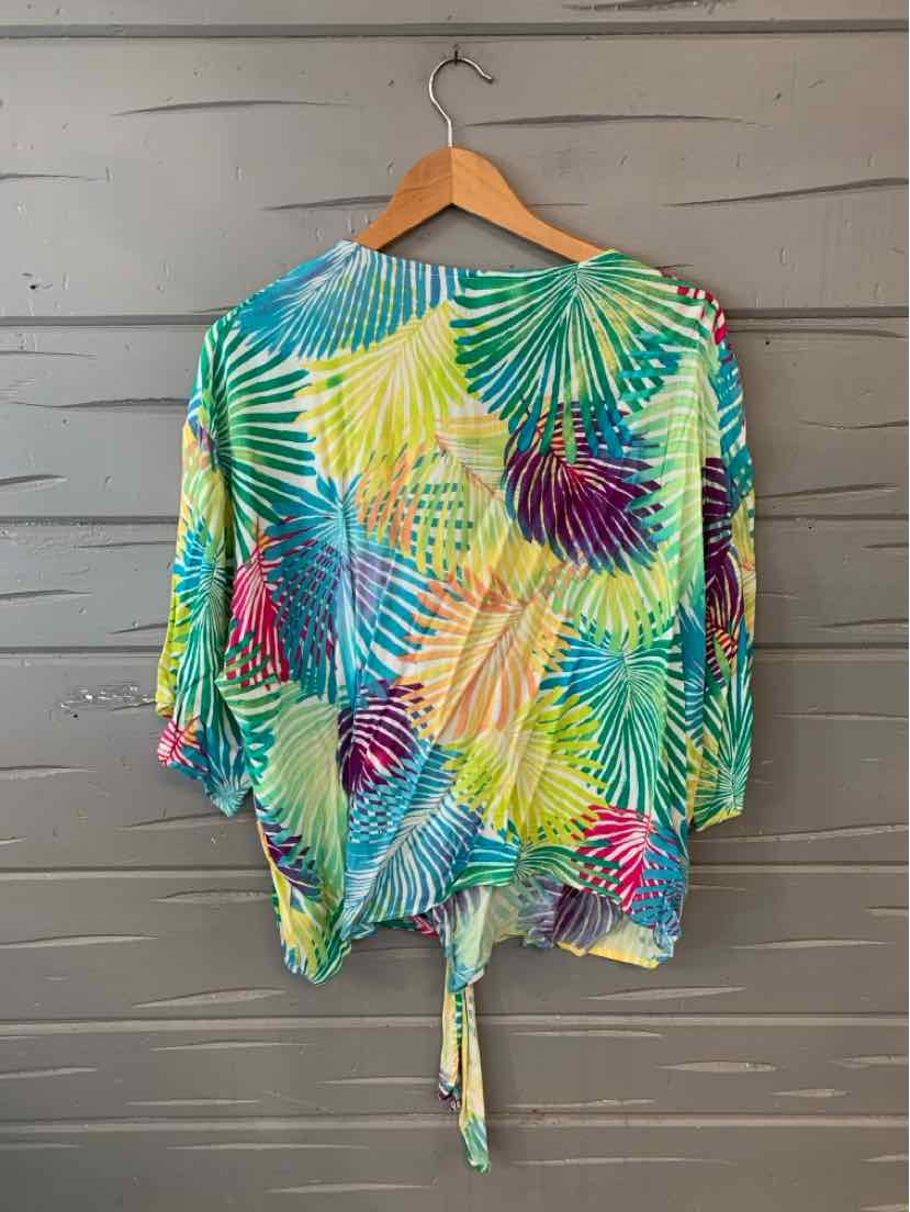 Lightweight tropical print blouse with blue, green, yellow, and pink palm leaves, tie-front hem, and elbow-length sleeves in .