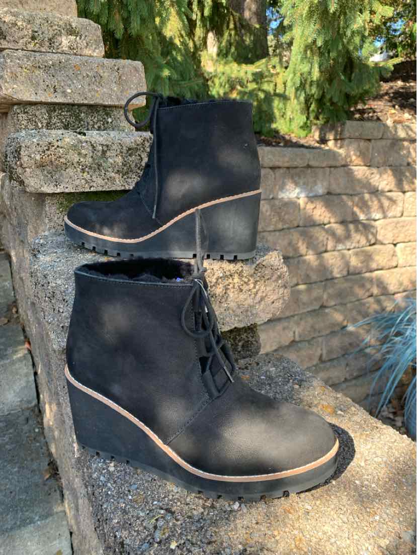 Black suede lace-up ankle boots with rounded toes, chunky block heels, and contrasting tan welt trim.