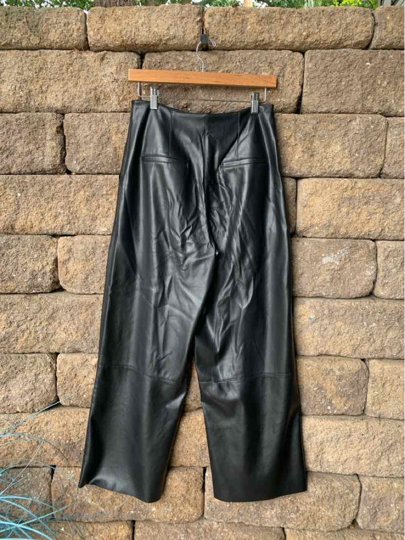 Black leather wide-leg pants with front seam details and a high waist, size small.