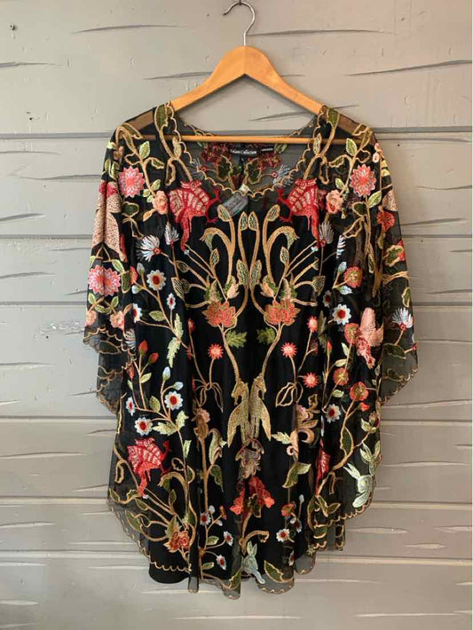 Black floral sheer tunic with gold embroidered accents and pink and green flower patterns, size large.