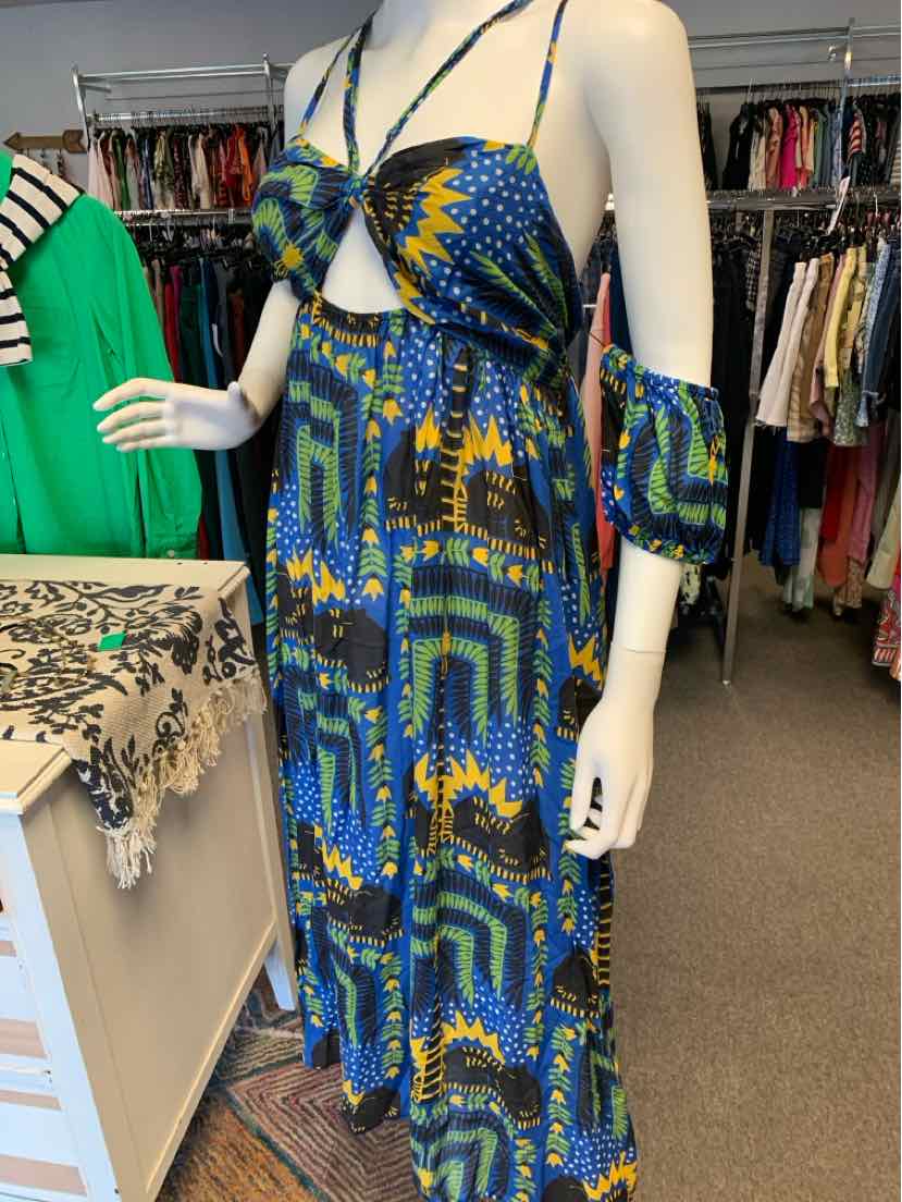 Blue patterned maxi dress with cutout front and matching arm scarf on mannequin.