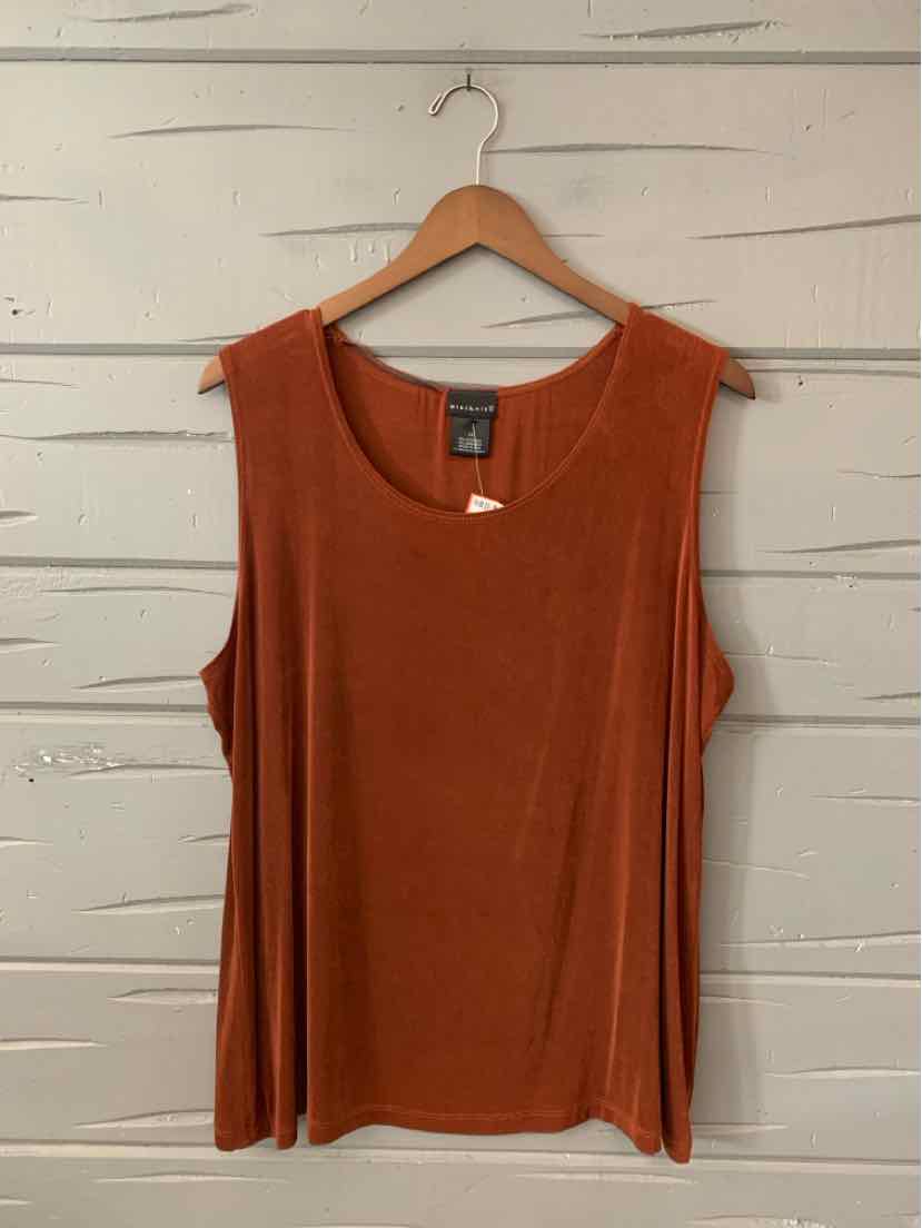Rust-colored sleeveless knit tank top with scoop neckline and relaxed fit on wooden hanger.