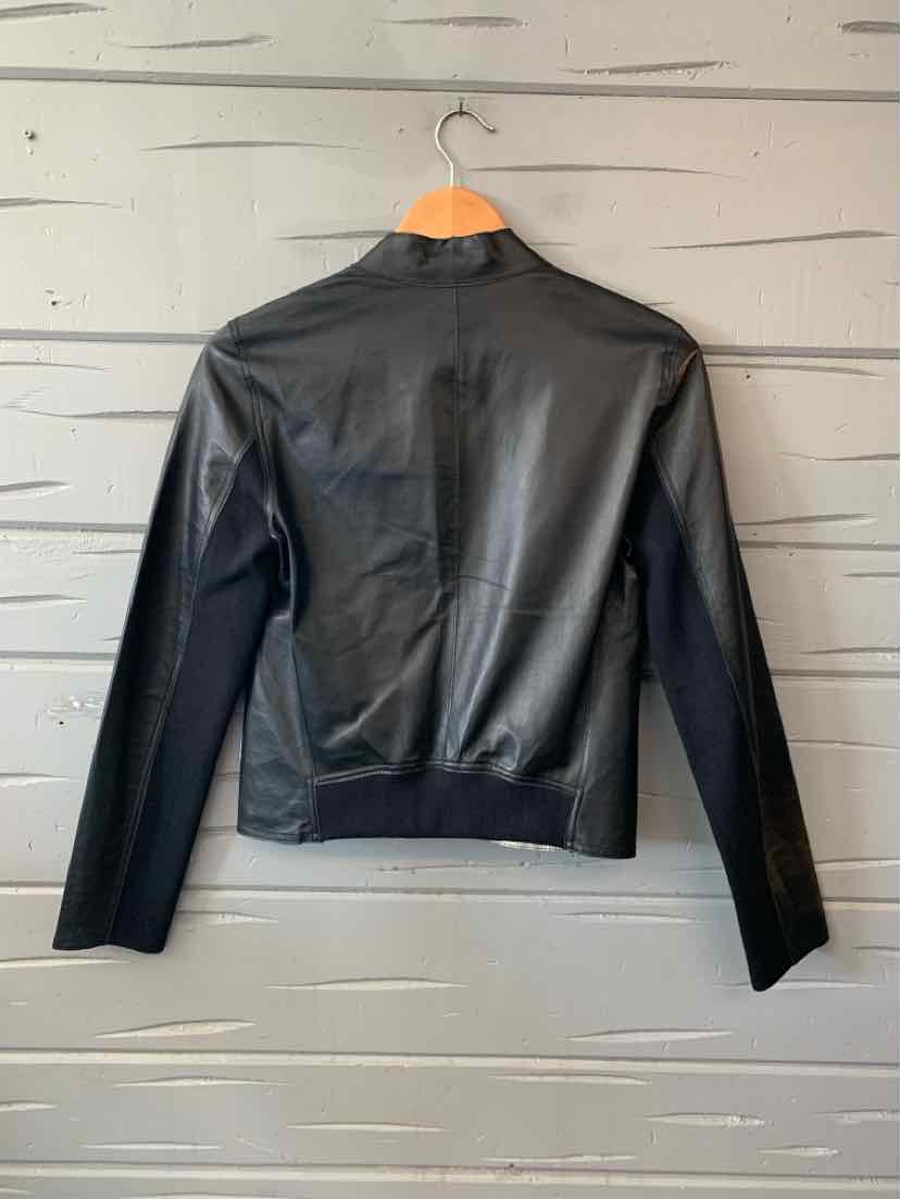 Black leather LAMARQUE jacket with a cropped fit, zip front, and long sleeves.