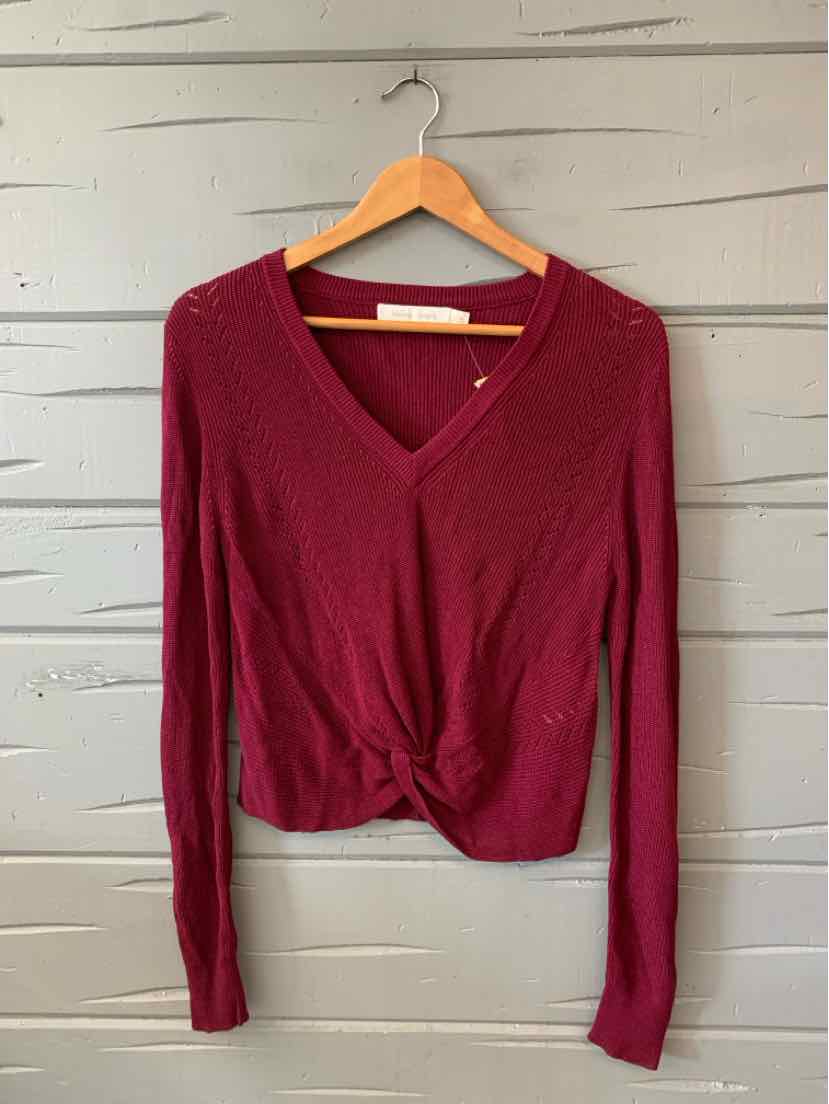 Burgundy long-sleeve V-neck lightweight knit sweater with fitted cuffs and waist detailing.