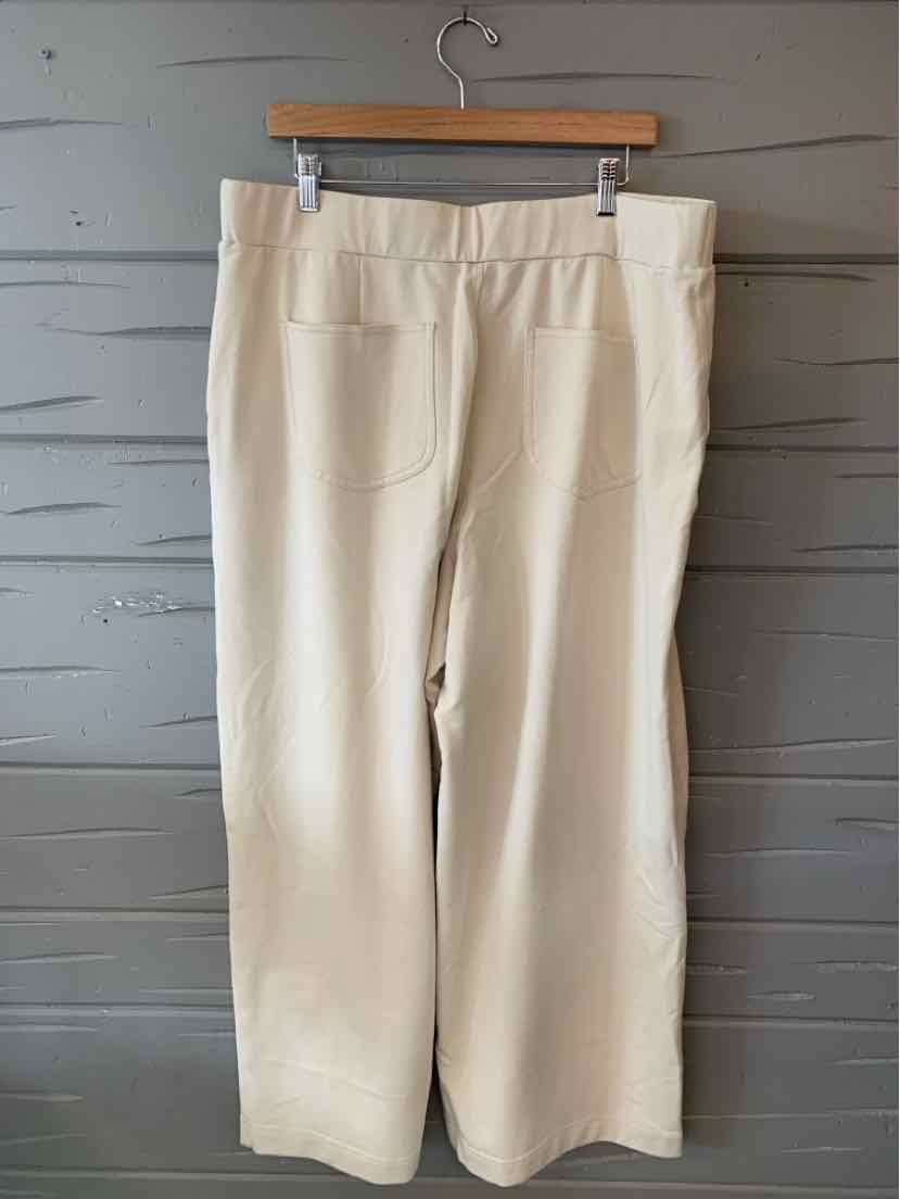 Cream-colored wide-leg pants with elastic waistband and front patch pockets in size XXL.