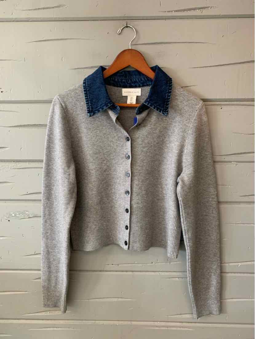 Gray knit cardigan with a dark blue denim collar, button front, and long sleeves.