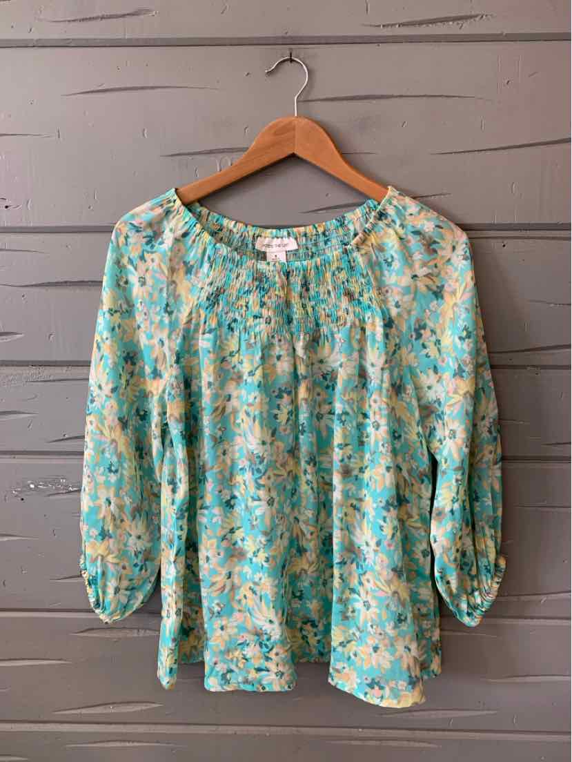 Teal floral blouse with long sleeves and gathered neckline, loose fit, lightweight fabric.