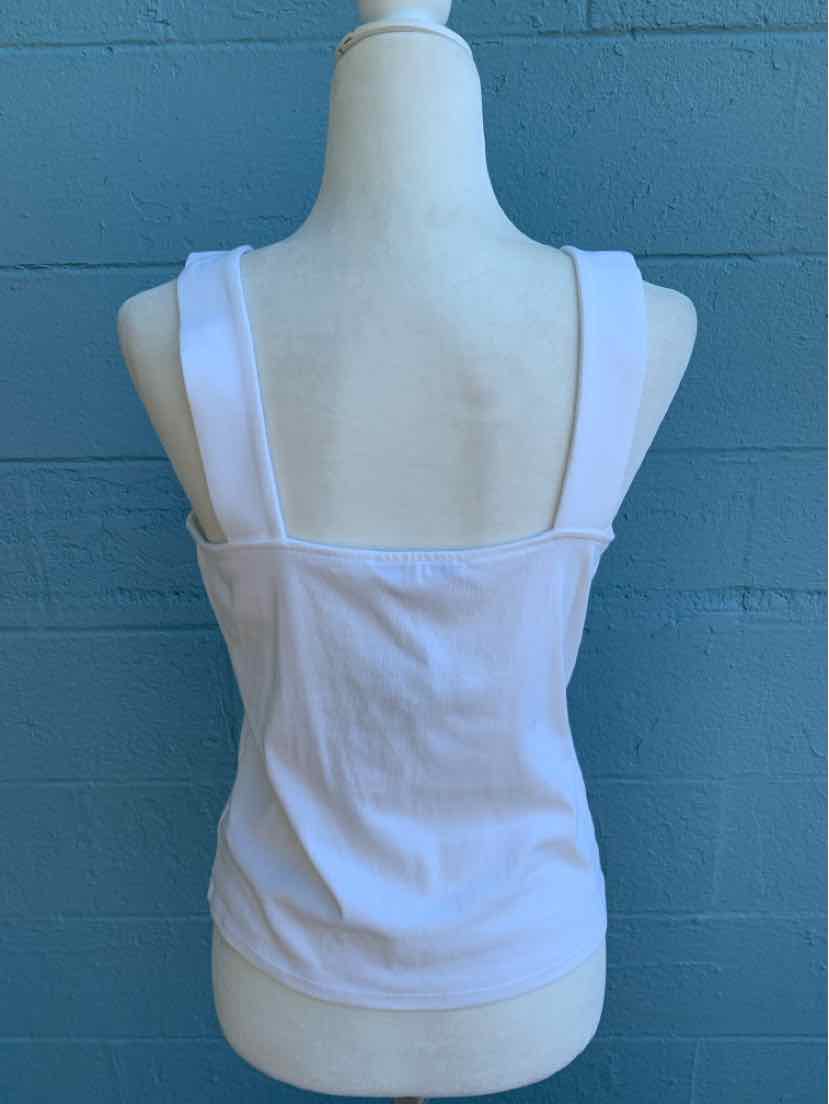 White sleeveless tank top with wide straps and square neckline on mannequin back.