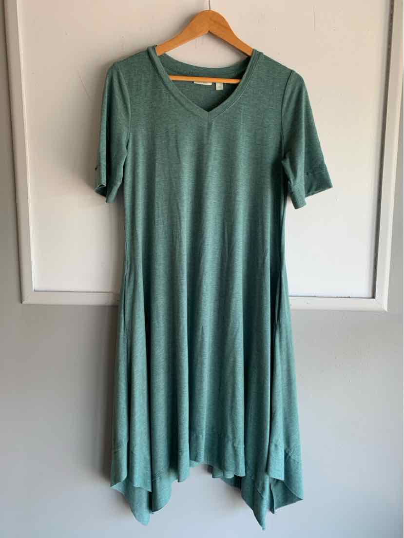 Teal short-sleeve v-neck dress with asymmetrical hem on wooden hanger.