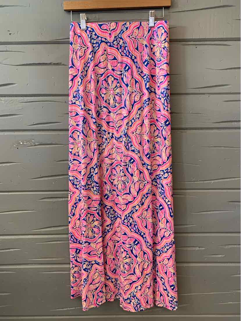 Pink maxi skirt with bold paisley pattern in blue and white, flowing fit, size XS.