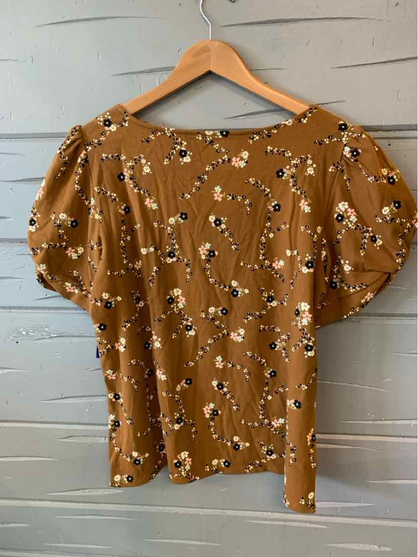 Tan floral short-sleeve blouse with puff sleeves and round neckline in size XL.