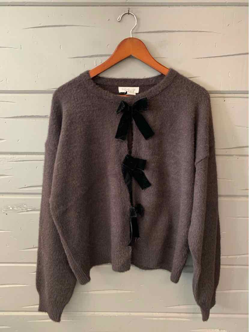 Heather charcoal Rachel Zoe sweater with a crew neck, long sleeves, and three black bow accents down the front.