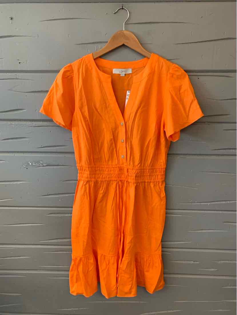 Orange short-sleeve romper with V-neck and gathered waist on wooden hanger.
