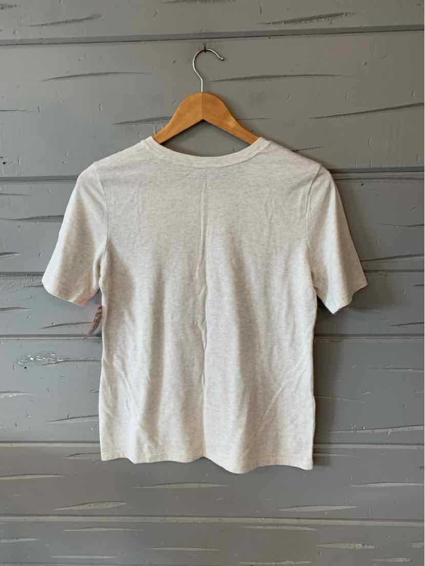 Light gray short-sleeve cotton t-shirt with crew neck, slim fit, hanging on wooden hanger.