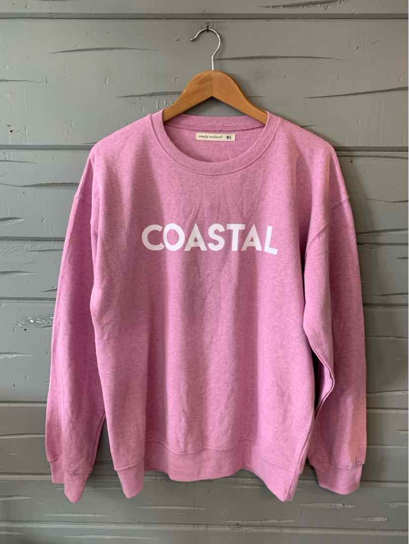 Lavender crewneck sweatshirt with "COASTAL" printed in white across the chest, relaxed fit, ribbed cuffs and hem.