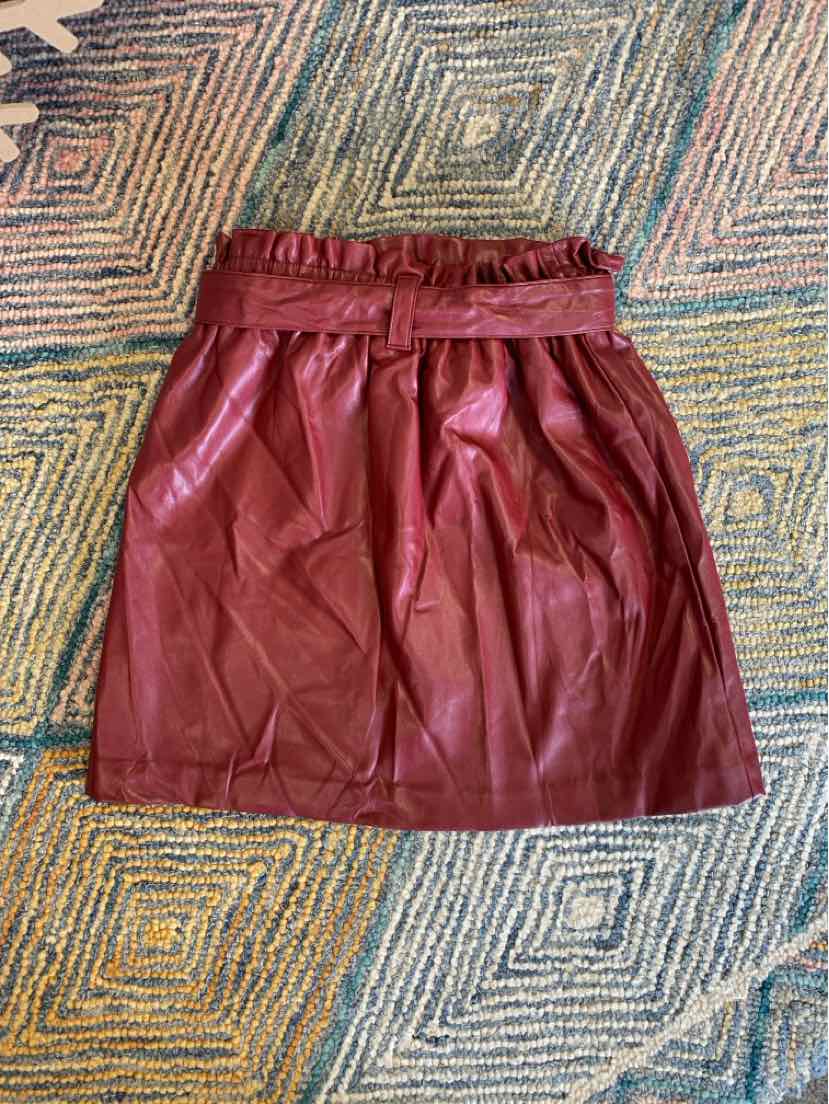 Red faux leather skirt with gathered elastic waistband in small petite size.