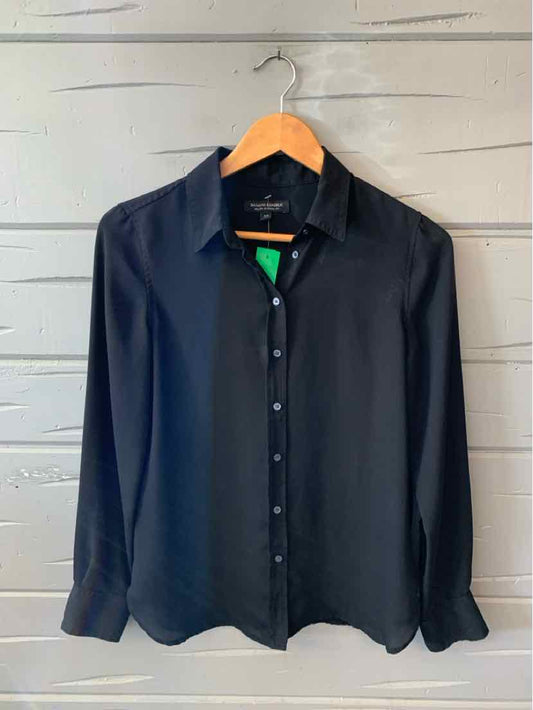 Black long-sleeve button-up blouse in XS with a classic collar and smooth fabric.
