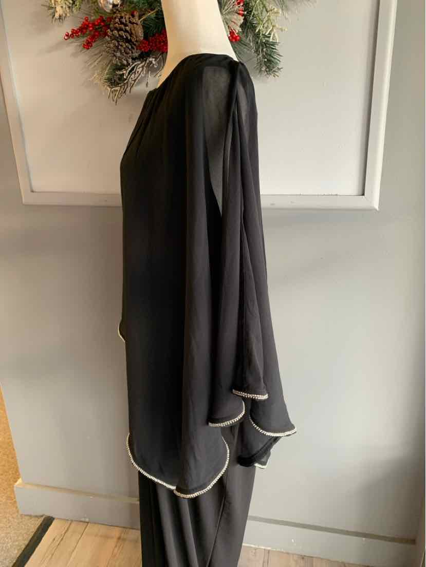 Black layered chiffon blouse with scalloped edges and long sleeves, size XXL.