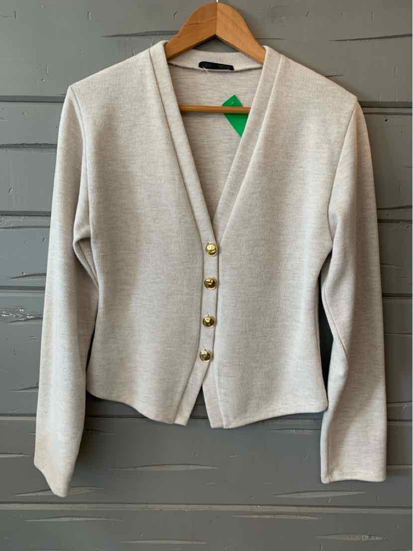 Beige long-sleeve cardigan with v-neck and four gold buttons on front, medium size, knit fabric.
