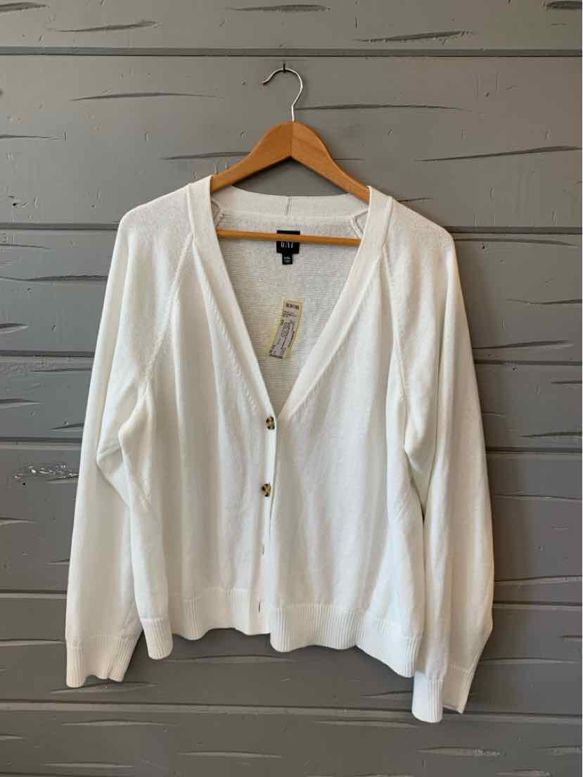 White V-neck cardigan with long sleeves and button closure, size XXL, lightweight knit.