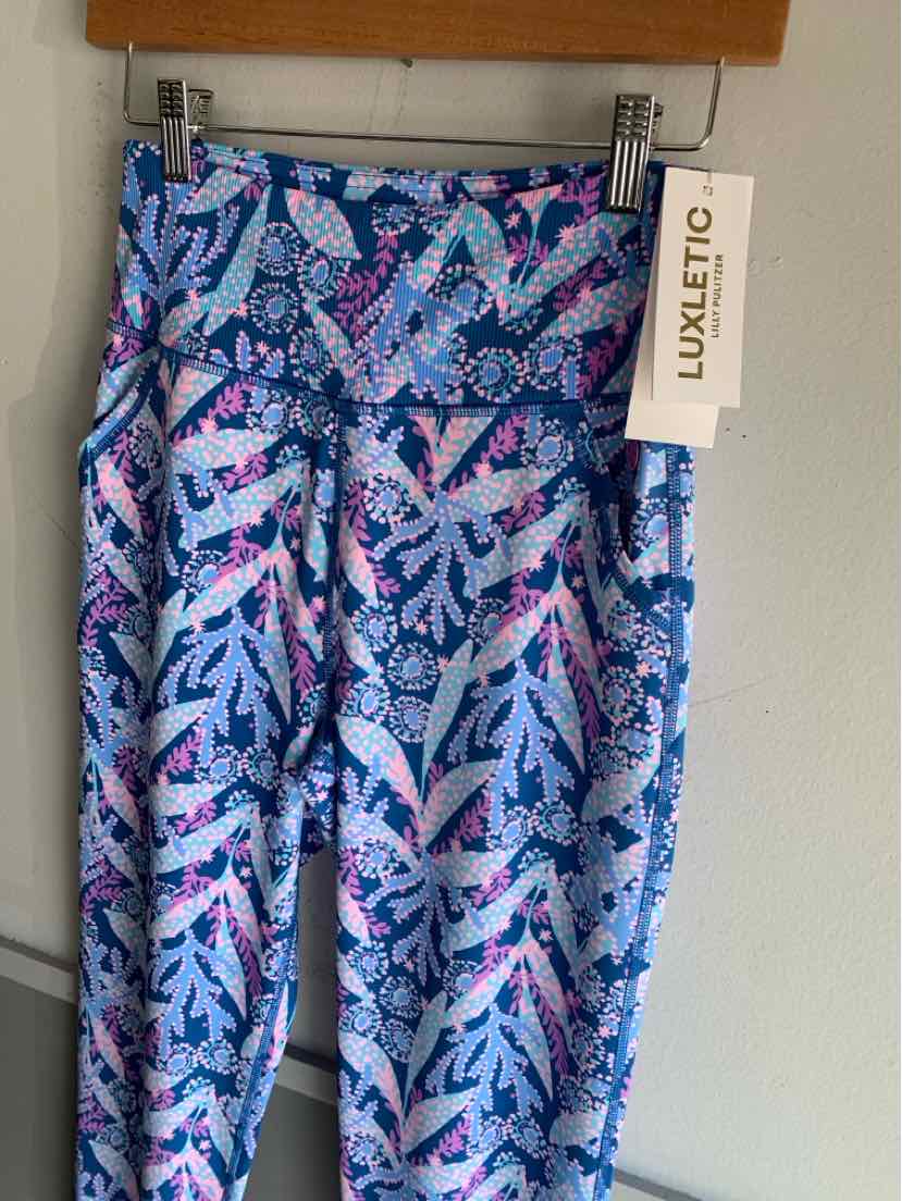 Blue patterned Lilly Pulitzer skirt with pink and white starfish design, size small.