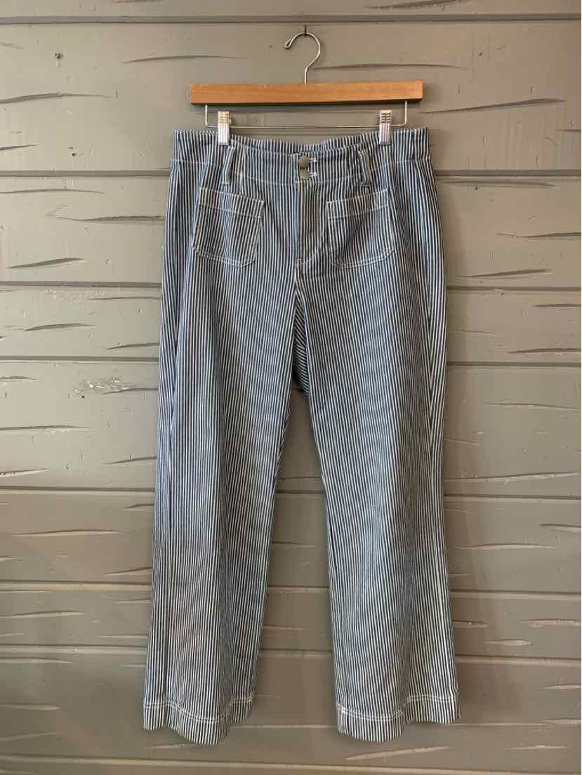 Gray and white vertical striped straight-leg pants with front button and zipper closure.