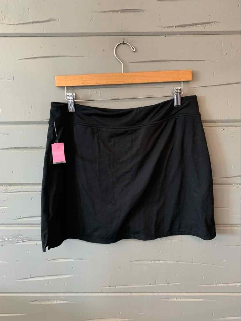 Black knee-length skirt with slight A-line cut, smooth fabric, medium size label visible on side tag.