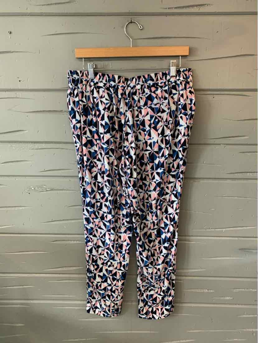 Slim-fit lightweight pants with abstract multicolor geometric pattern in shades of blue, black, and beige, size small.