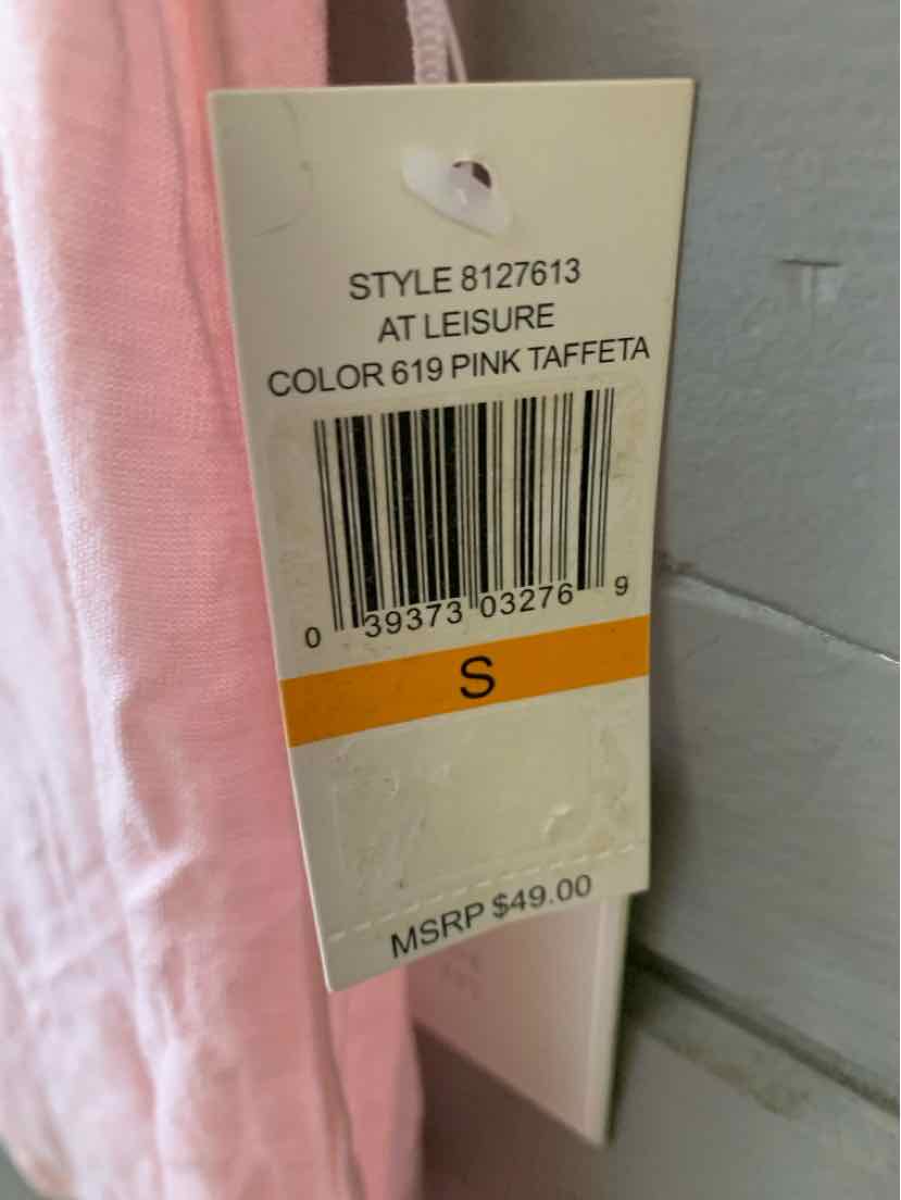 Pink taffeta fabric with attached beige clothing tag showing size S and barcode.