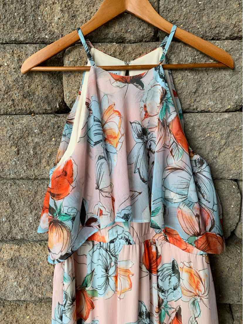 Sleeveless floral dress in soft pink with blue, orange, and green flower prints, size 14.