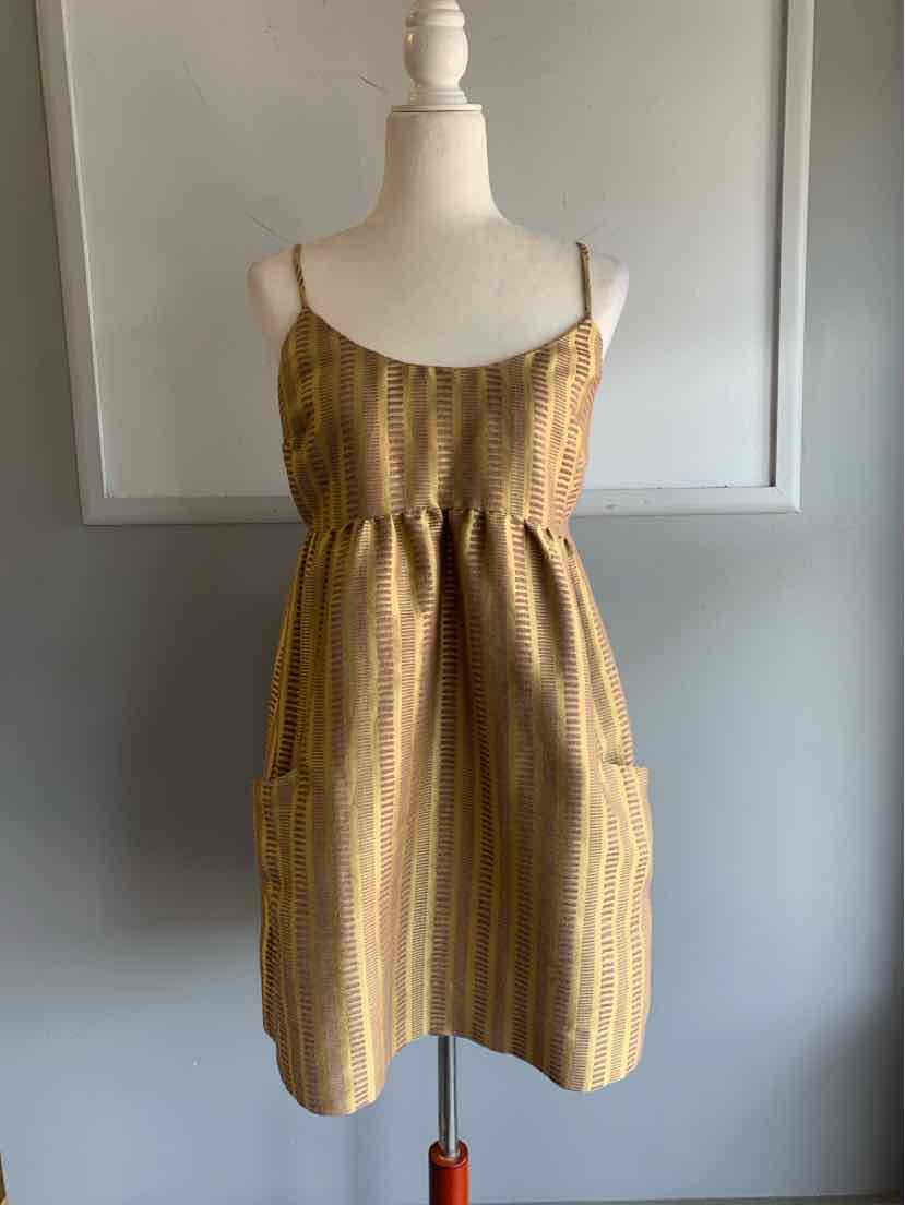 Sleeveless gold and brown striped jacquard dress with a gathered waist and pockets, size 8.