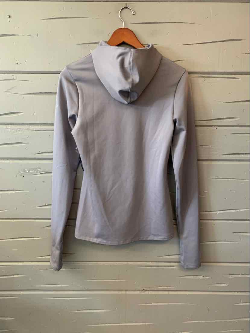 Light gray long-sleeve hoodie with slim fit and smooth fabric, displayed on wooden hanger.