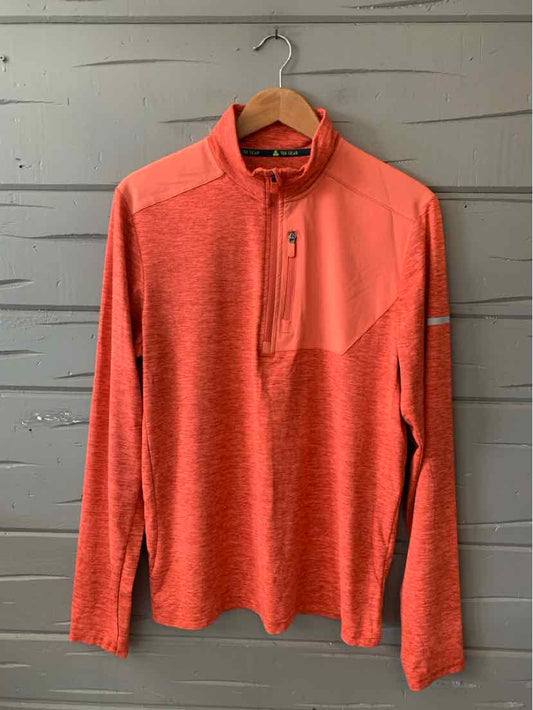 Men’s long-sleeve, quarter-zip pullover in solid orange with a textured fabric panel on the upper chest and a small chest.