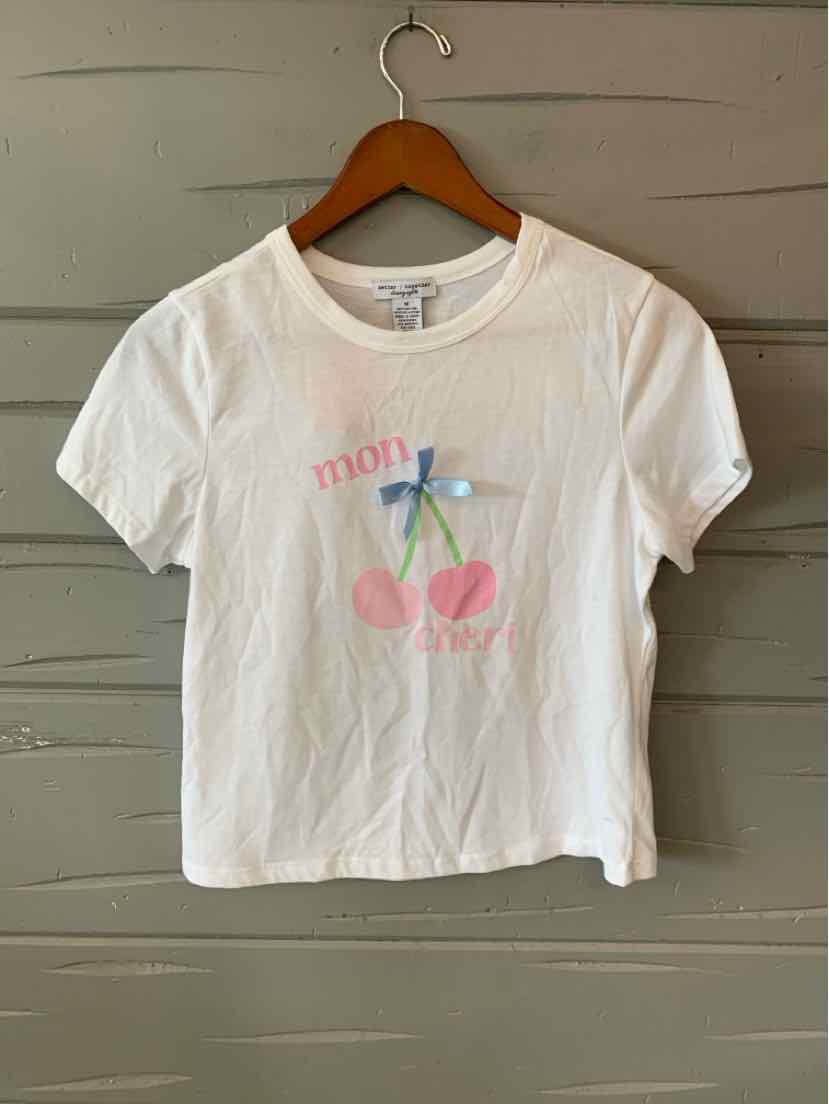 White cropped cotton t-shirt with short sleeves and a pastel cherry graphic on the front.