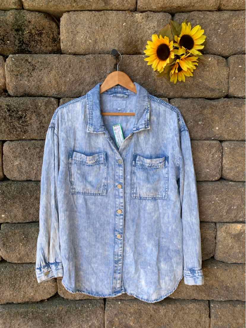 Light blue acid-wash denim button-up shirt with long sleeves and two chest pockets.