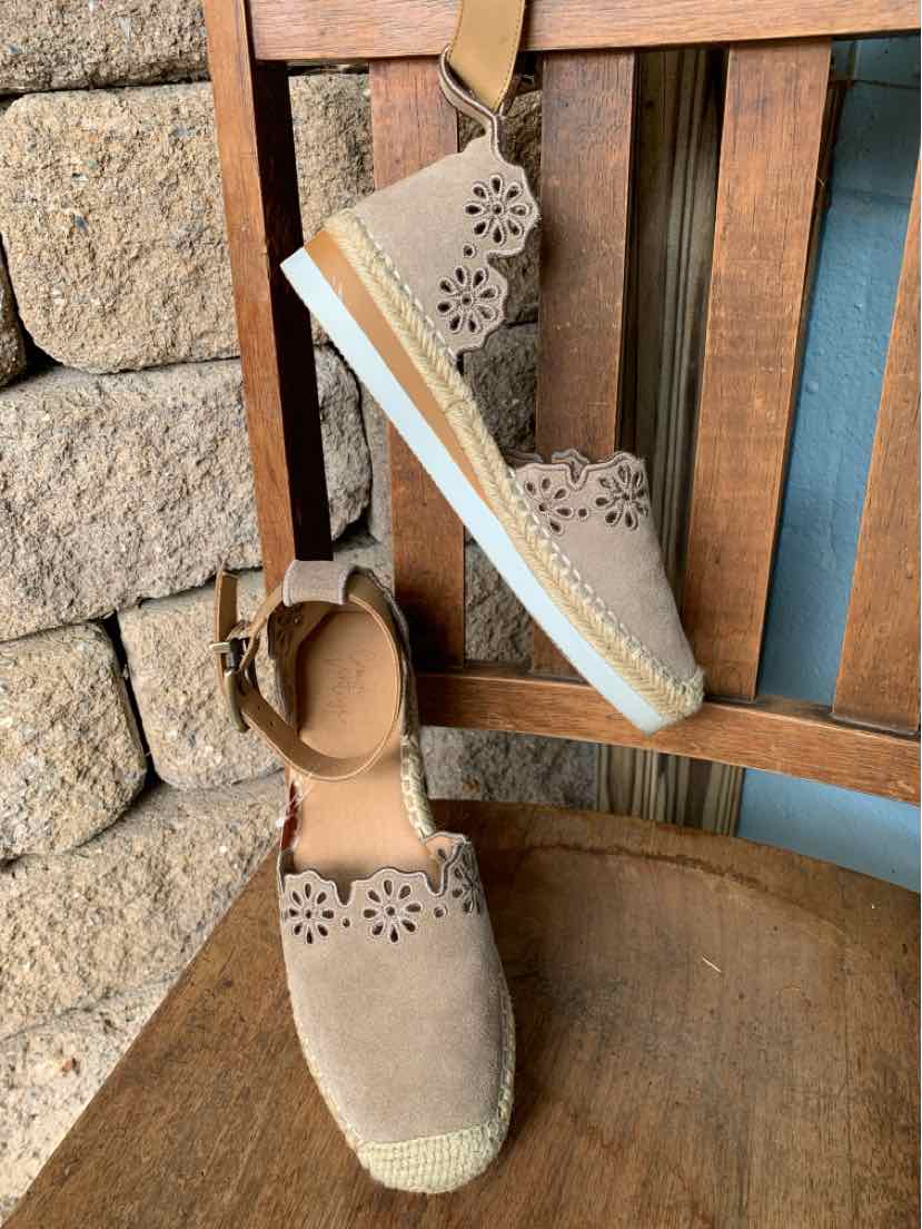 Light brown suede espadrille flats with laser-cut floral patterns and braided jute soles, size 7.