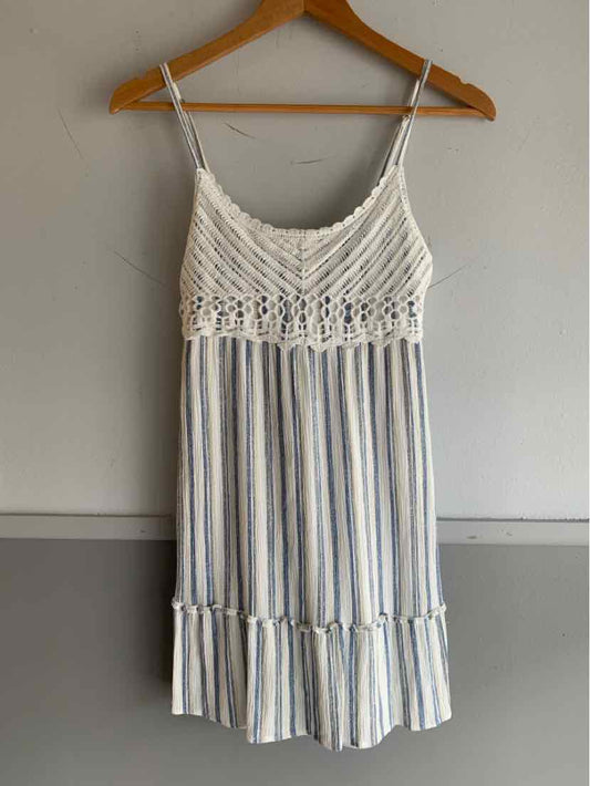 Blue and white striped sleeveless dress with crocheted lace bodice and ruffled hem, size XS.