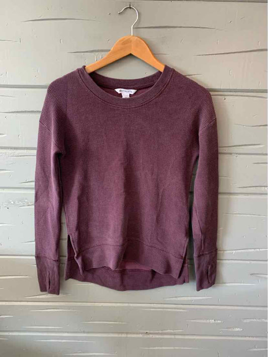 Women's burgundy crewneck sweatshirt with long sleeves and ribbed cuffs, size XXS.