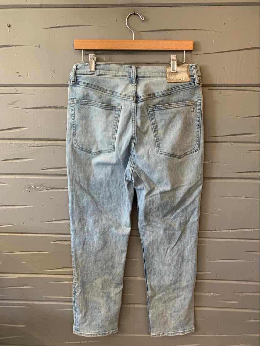 Light wash denim jeans with a straight leg and two back pockets, size 8.