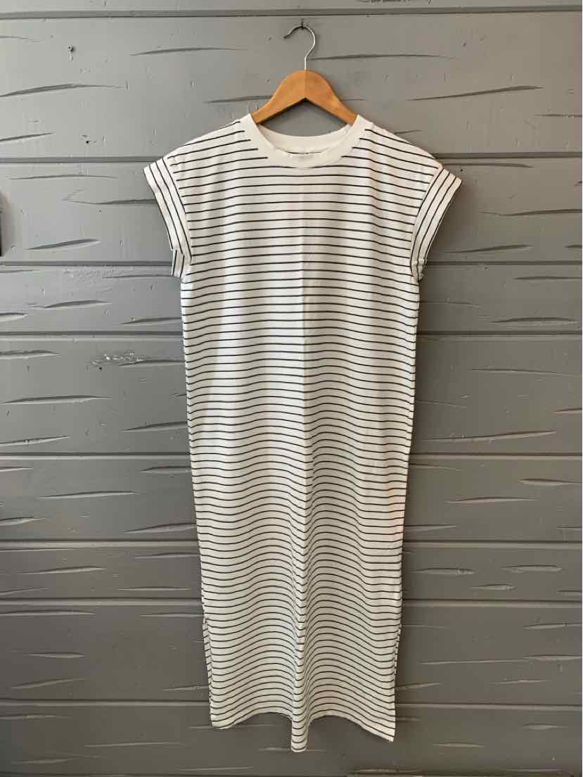 White and gray striped short-sleeve midi dress with a crew neckline and relaxed fit.