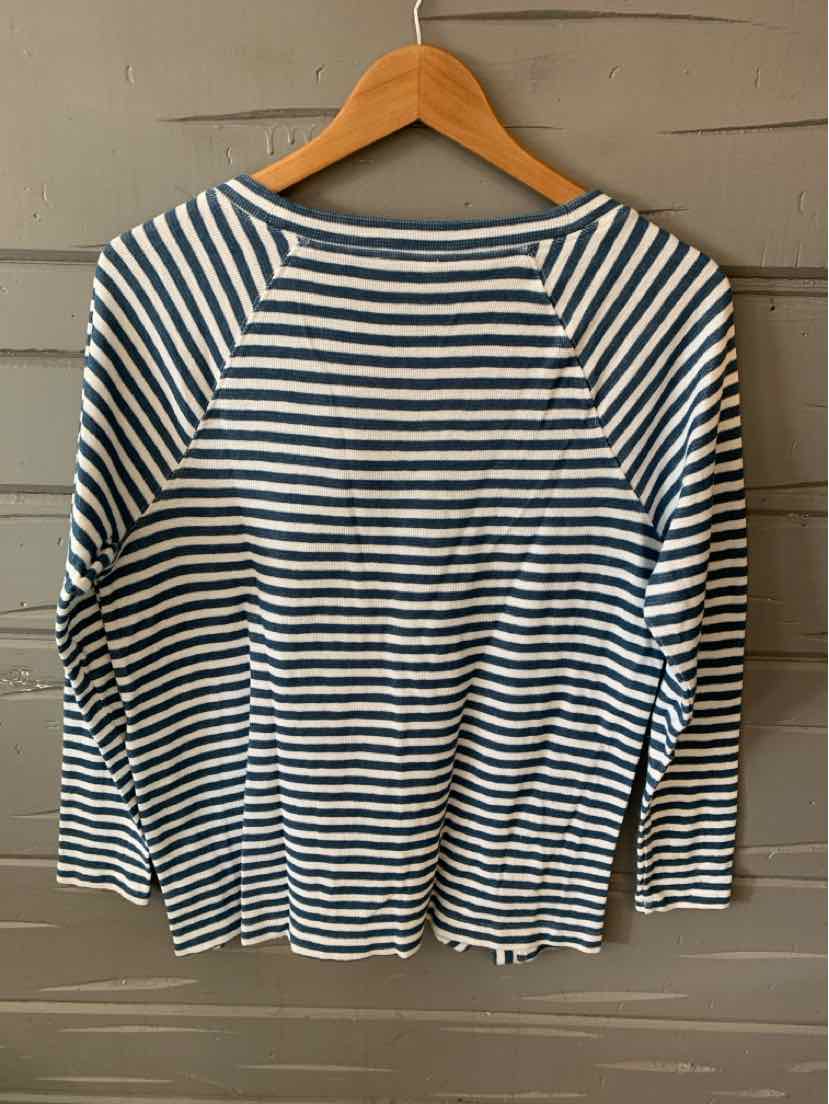 Blue and white horizontal striped long-sleeve shirt with boat neckline on wooden hanger.
