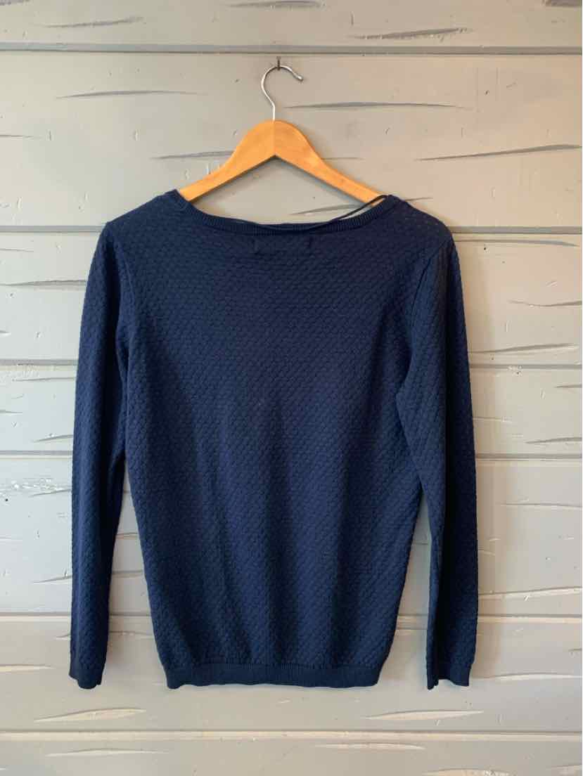 Navy blue long-sleeve knit sweater with a round neckline and ribbed cuffs and hem.