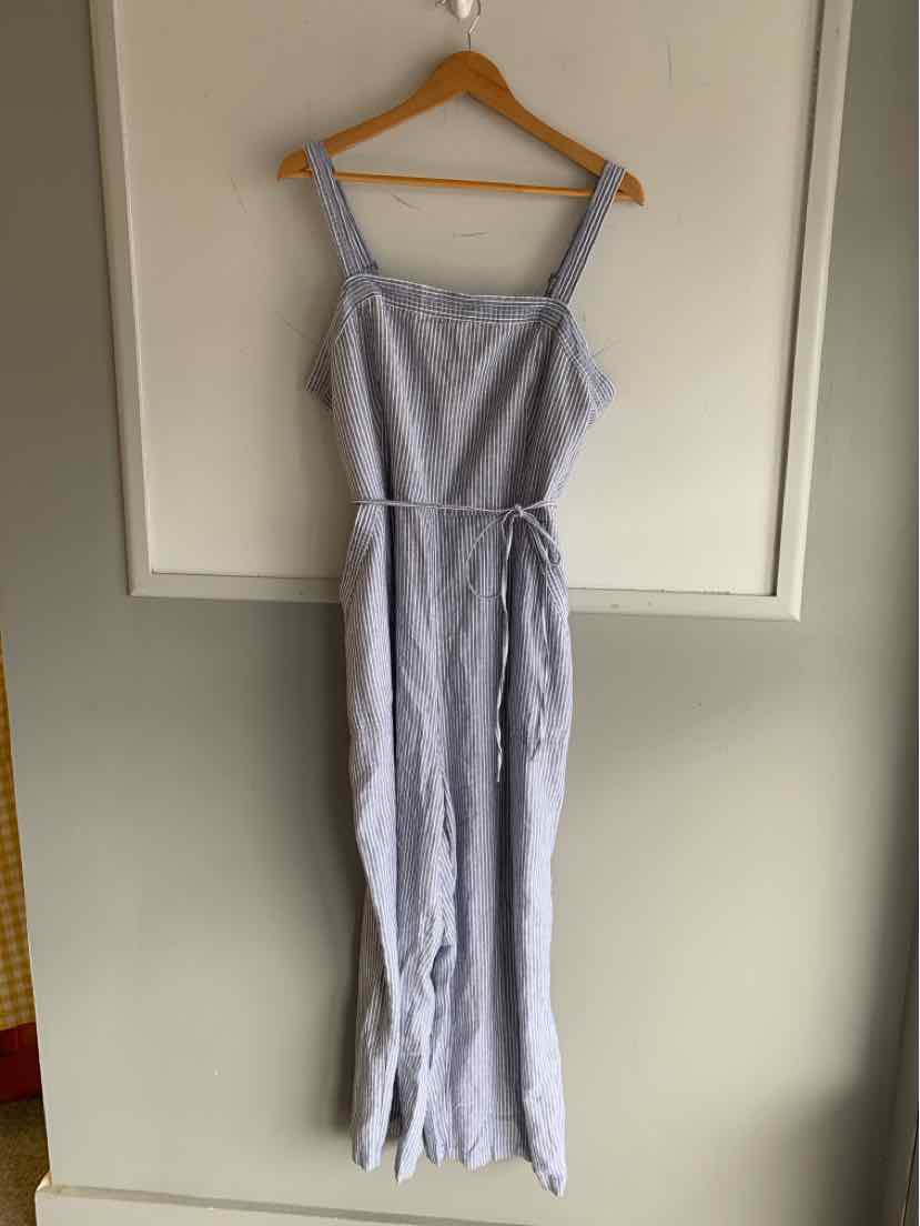 Light blue and white striped sleeveless jumpsuit with adjustable straps and waist tie, size XL.