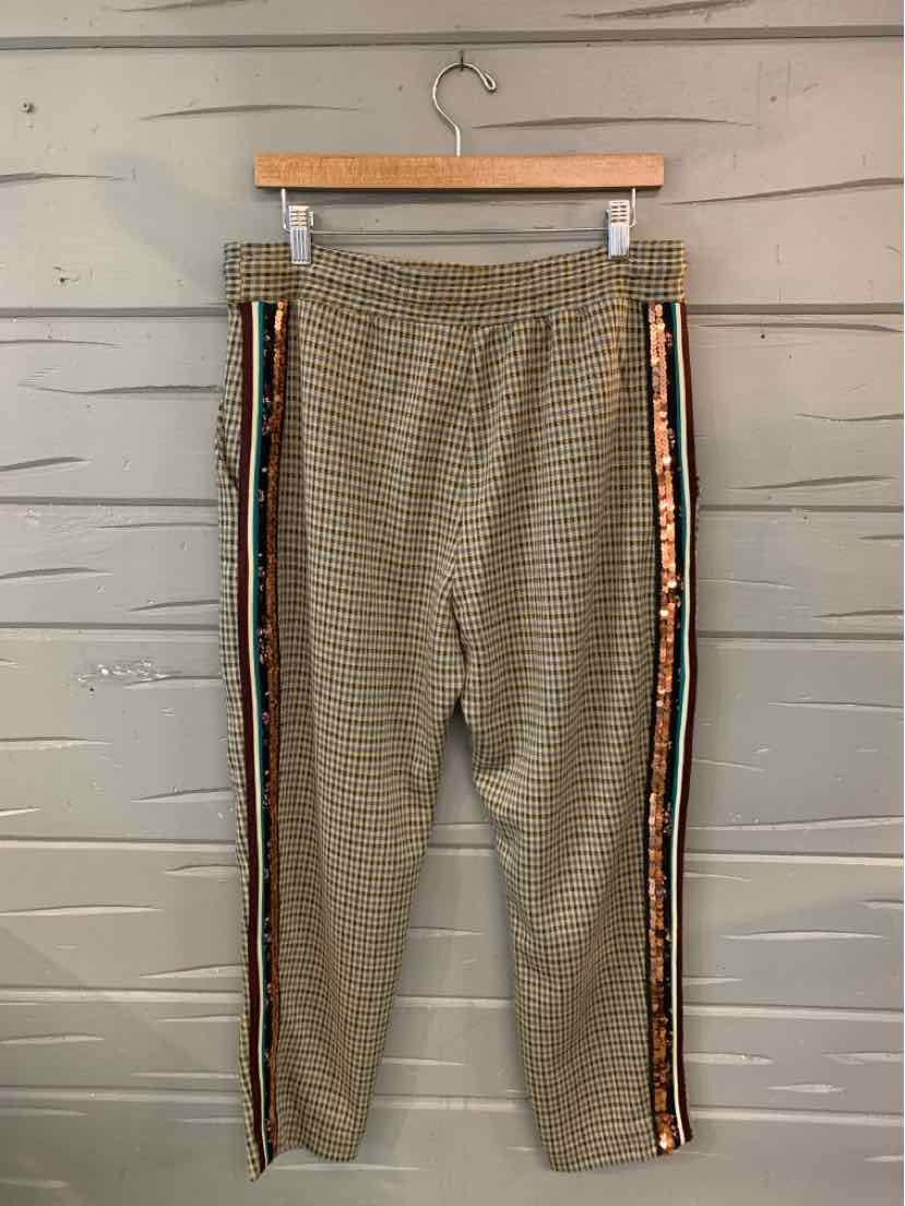 Beige houndstooth patterned pants with black and orange side stripes, elastic waist, slim fit, petite size.