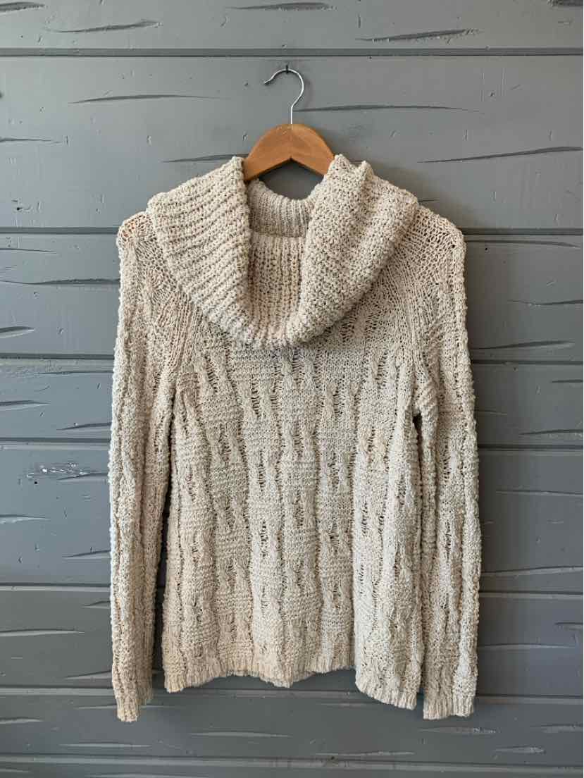 Cream-colored knit sweater with cowl neck and textured tribal pattern, medium size.