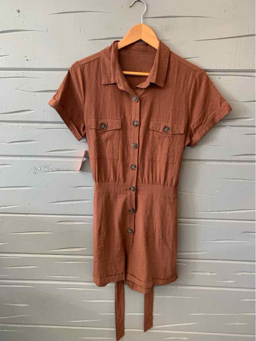 Rust-colored short-sleeve button-down shirt dress with chest pockets and a waist tie belt.