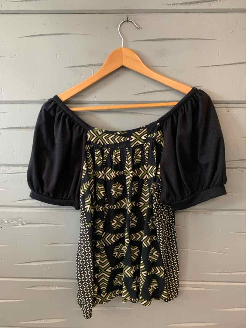 Black blouse with square neckline, puffed short sleeves, and gold geometric pattern on front panel.